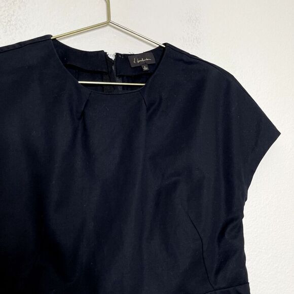 Aritzia T. Babaton Top Size 4 Black Peplum Zip Back Career Office Modern Classic - Picture 1 of 10